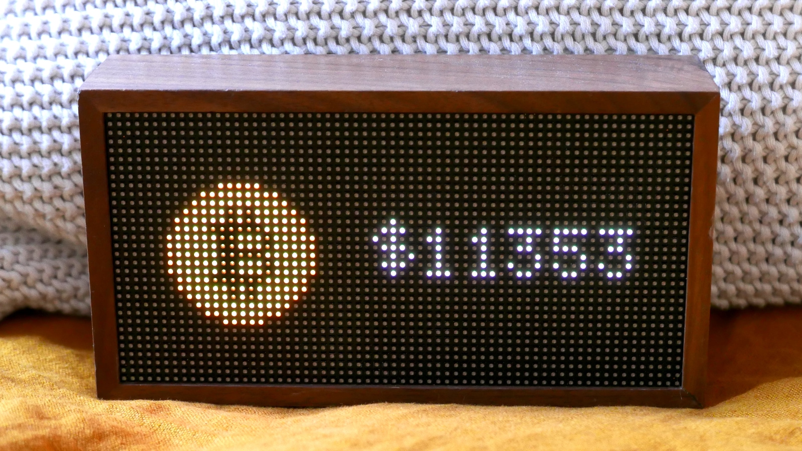Tronbyt device displaying a Bitcoin tracker